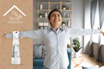 Lively Indian woman with a wide smile and MyHomePlus disinfectant spray in the frame