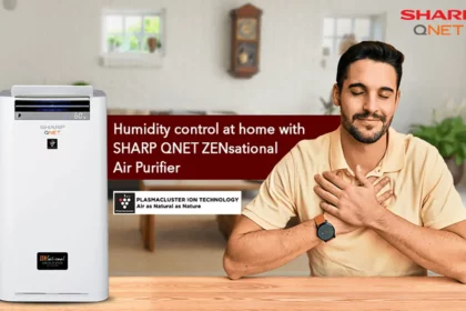 Happy Indian man breathing fresh air at home with SHARP QNET ZENsational air purifier in the frame