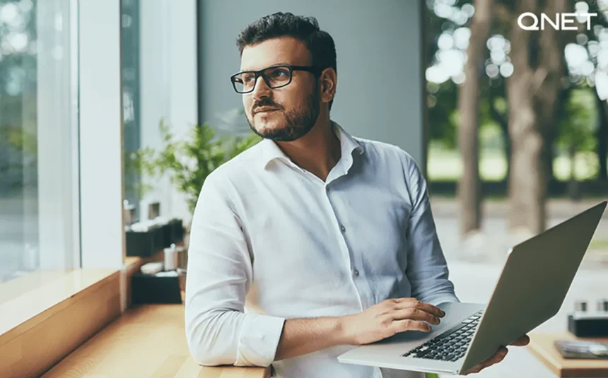 A Network marketer looking out the window