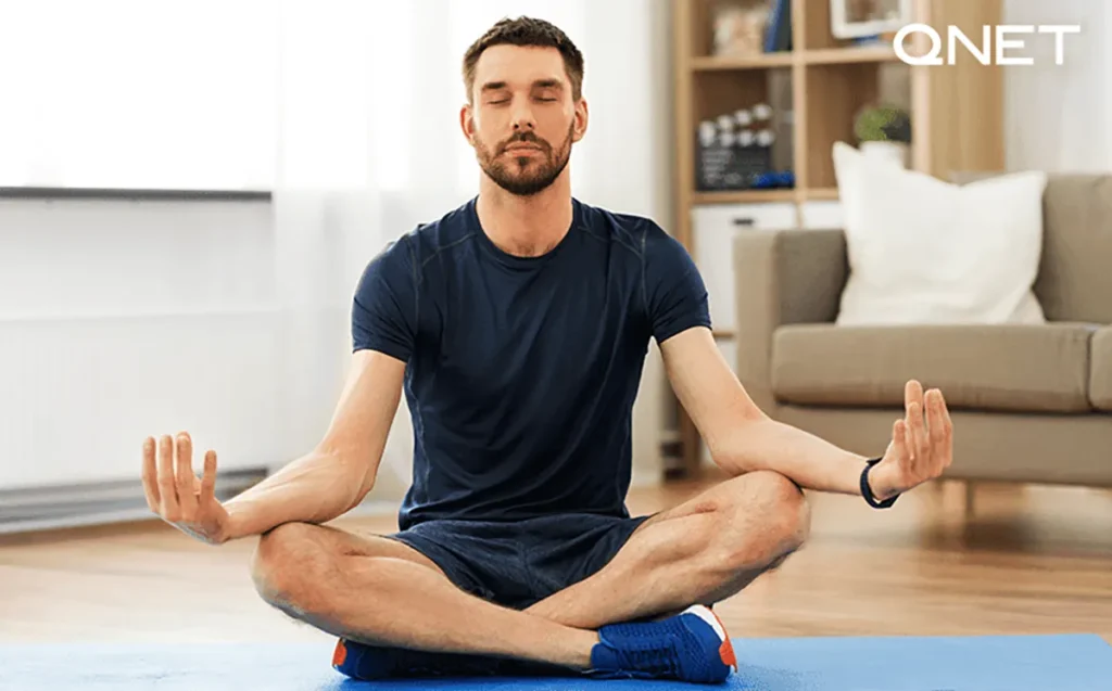 A man mediating indoors | SHARP ZENsational Home Air Purifier